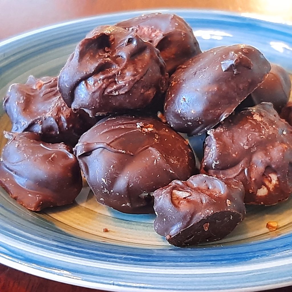 Vegan peppermint patties and chocolate almond marzipan on a plate